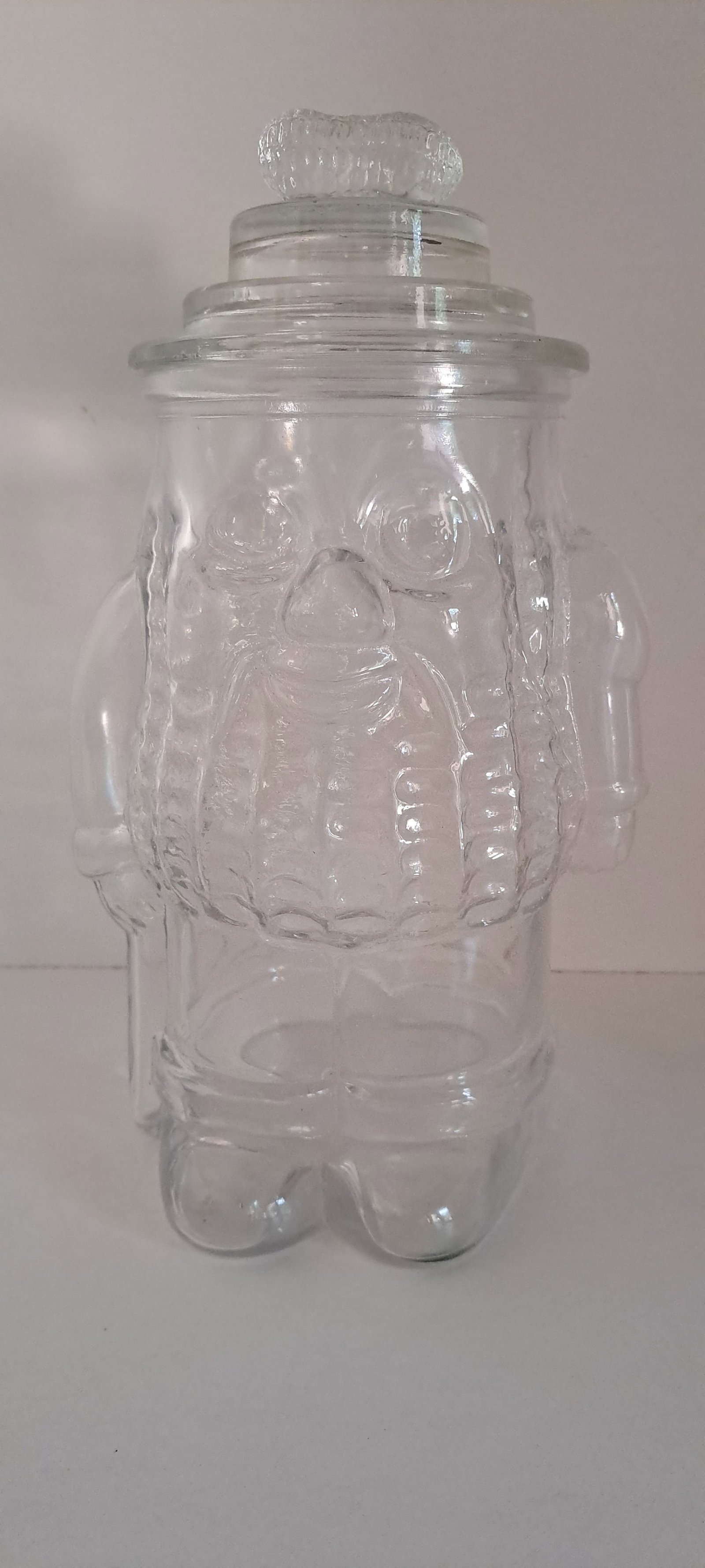 Mr. Peanut glass jar: Glass counter jar, shaped like Mr. Peanut with peanut shaped handle on lid. Clear glass. This is a fantasy jar made in the 90's, not original. Very good condition. No chips or cracks. Approx. 13"