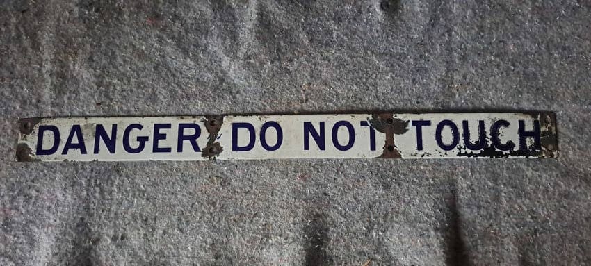"DANGER DO NOT TOUCH" porcelain sign (1 of 5)
