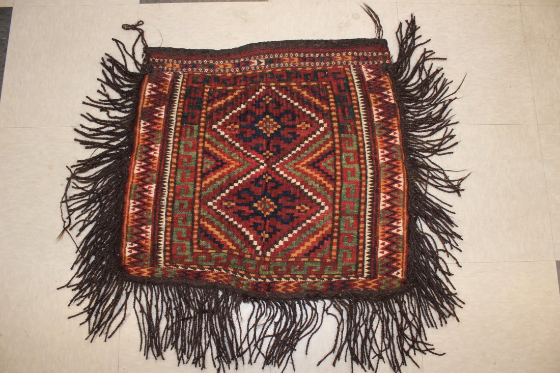 Uzbek Bag or Seat Cushion: Uzbekistan or Afghanistan. Early 20th century. 22x23 inches without fringe. Weight is 3 pounds. Natural colors.