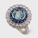 An aquamarine, sapphire, diamond, and platinum ring,