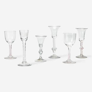 A group of six English twist stem wine and cordial glasses circa 1730-1815: A group of six English twist stem wine and cordial glasses circa 1730-1815 Comprising three George I / II wine and cordial glasses, circa 1730-1750, one with etched grapevine motif to bowl; a George