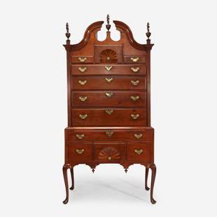 A Queen Anne inlaid walnut bonnet-top high chest Boston, MA, circa 1760: A Queen Anne inlaid walnut bonnet-top high chest Boston, MA, circa 1760 The upper and lower case with recessed fan-inlaid drawers, and string-inlaid sides. (H: 85 in. W: 41 in. D: 22 1/2 in.) 