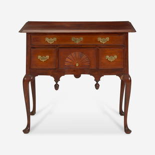 A Queen Anne inlaid walnut dressing table Boston, MA, circa 1750: A Queen Anne inlaid walnut dressing table Boston, MA, circa 1750 Line inlaid top with notched corners, recessed central drawer inlaid with fan. (H: 30 in. W: 36 in. D: 20 1/2 in.) ProvenanceA