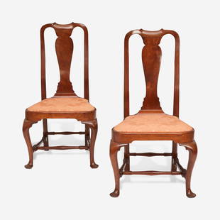 A pair of Queen Anne carved walnut compass-seat side chairs Boston, MA, circa 1745: A pair of Queen Anne carved walnut compass-seat side chairs Boston, MA, circa 1745 The frames and slip seats marked "I" and "VI" respectively, with shaped crests, solid vasiform splats, raised on