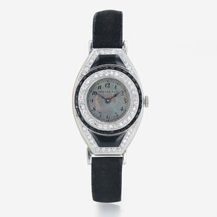 A Lady's Art Deco Dreicer & Co. Strap Watch: A Lady's Art Deco Dreicer & Co. Strap Watch A lady's Dreicer & Co. watch with 17J HAAS Swiss movement featuring a rounded dial in a tonneau case, framed by caliber-cut black onyx and onyx inlay su