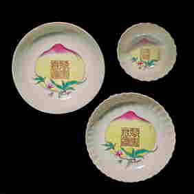 A Chinese ruby-back porcelain "Wan Shou Wu Jiang" "Peach" tea bowl and two saucers &#33836;&#22781; (1 of 3)