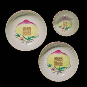 A Chinese ruby-back porcelain "Wan Shou Wu Jiang" "Peach" tea bowl and two saucers &#33836;&#22781; (1 of 3)