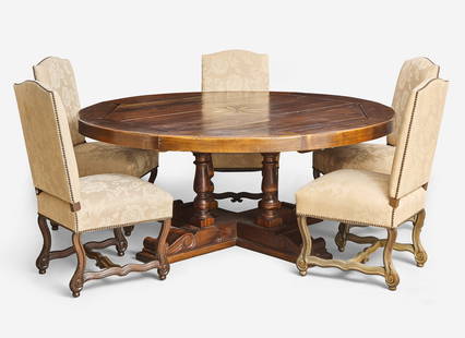 A Baroque style circular pine dining table together with a set of five Baroque style upholstered: A Baroque style circular pine dining table together with a set of five Baroque style upholstered wood dining chairs, modern The table with inlaid star to center, on turned legs connected by bold stand