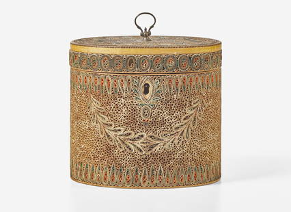 A George III rolled paper tea caddy, circa 1790 Oval form, with interior inlaid lid. H: 5: A George III rolled paper tea caddy, circa 1790 Oval form, with interior inlaid lid. H: 5 in. W: 5 ½ in. D: 3 ¼ in. Provenance Bearing Christie's tag Charlton Hall Auctioneers, West Colu