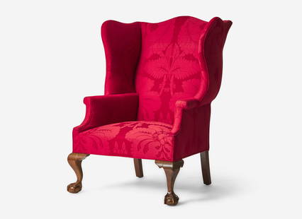A Chippendale mahogany easy chair with red damask upholstery, circa 1780 and possibly later With: A Chippendale mahogany easy chair with red damask upholstery, circa 1780 and possibly later With generous upholstered back rest, scrolled arms on cabriole legs ending in ball-and-claw feet. H: 45 in.