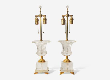 A pair of Neoclassical style gilt bronze-mounted rock crystal table lamps, 20th century   Of urn: A pair of Neoclassical style gilt bronze-mounted rock crystal table lamps, 20th century Of urn form, on square plinths raised by paw-form feet.&nbsp; H: 26 &#189; in. W: 6 in. D: 6 in.&nbsp; Provenanc