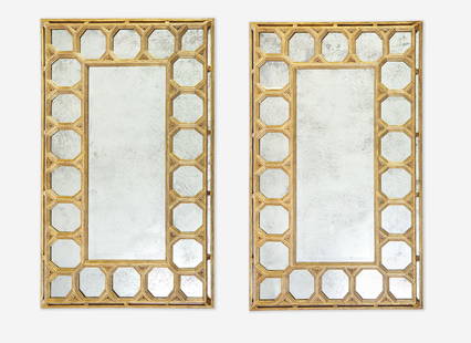 A pair of Spanish style giltwood mirrors, modern With octagonal panels, aged mirror plates. : A pair of Spanish style giltwood mirrors, modern With octagonal panels, aged mirror plates. 63 ¼ in. x 38 in. Provenance Christie’s, New York, European Furniture, Works of Art, and Ta