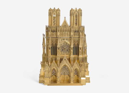 A French gilt bronze mantel clock in the form of Reims Cathedral, Pierre-Honoré-César Pons: A French gilt bronze mantel clock in the form of Reims Cathedral, Pierre-Honoré-César Pons (1773-1851), Paris, second quarter 19th century The back plates representing stained glass windows