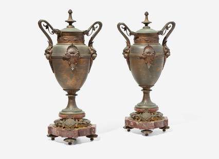 A pair of Renaissance Revival gilt and patinated bronze and marble urns, late 19th century The: A pair of Renaissance Revival gilt and patinated bronze and marble urns, late 19th century The covers with finials, scrolled handles with lion masque terminals, with anthemion motif to front, the base