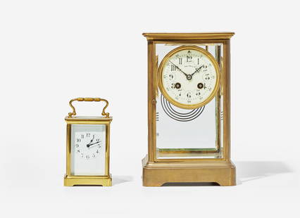 Two French gilt bronze carriage clocks, one by Samuel Marti & Cie, retailed by Tiffany & Co., New: Two French gilt bronze carriage clocks, one by Samuel Marti & Cie, retailed by Tiffany & Co., New York, NY, the other imported by Harris & Harrington (1896-1919), New York, circa 1900 The larger clock