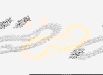 A Set of Matching Pearl and Diamond Jewelry: A Set of Matching Pearl and Diamond Jewelry An 18K white gold jewelry suite, including a pair of ear clips suitable for non-pierced ears with omega clip backs designed as flowers set throughout with r