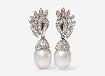 A Pair of 14K White Gold, South Sea Pearl and Diamond Earrings: A Pair of 14K White Gold, South Sea Pearl and Diamond Earrings A pair of 14K white gold earrings, suitable for pierced ears on stud posts with omega clip backs, designed as asymmetrical fronds set wit