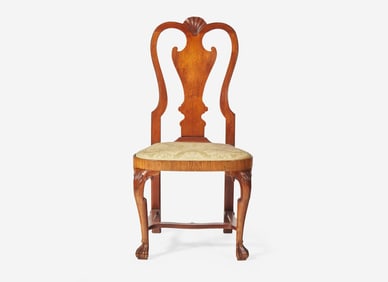 A Queen Anne carved walnut balloon seat side chair, Ireland, circa 1725