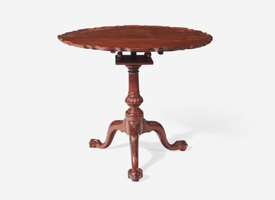 A Chippendale carved mahogany tilt-top tea table, carving possibly by the "de Young High Chest