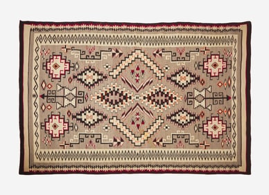 A large Navajo woven rug, 20th century