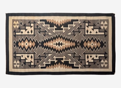 A large Navajo woven rug, 20th century