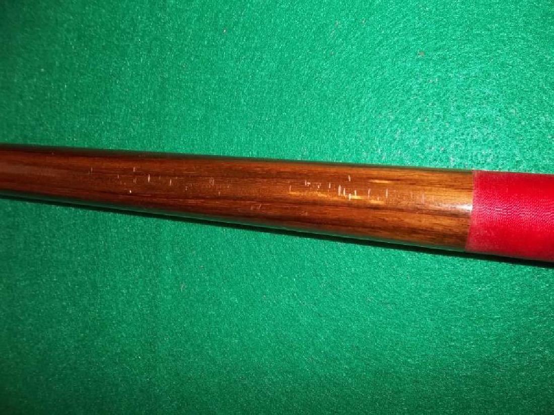 Palmer Custom Cue, 2 piece, 58", red and black: Palmer Custom Cue, 2 piece, 58", red and black wrap is stained, dings and scratches on butt and forearm,frrule is stained, hard black Joe Porper's case with pocket, 32" l,wrap is stained, dings and sc