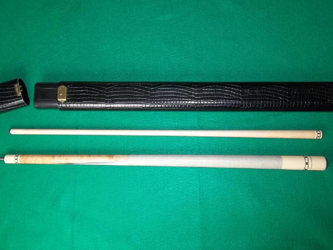 Meucci Originals Pool Cue, 2 Piece, 58", butt: Meucci Originals Pool Cue, 2 Piece, 58", butt near bumper is stained, hard black faux snakeskin style 2 pc. Viking case, 32" l,near bumper is stained, hard black faux snakeskin style 2 pc. Viking case