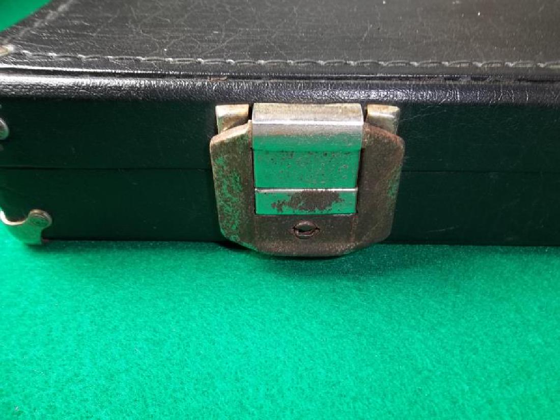 Palmer Custom Pool Cue, 3 piece, 1 butt and 2: Palmer Custom Pool Cue, 3 piece, 1 butt and 2 shafts, 58.5", wrap is unraveling, shafts and ferrules are stained, hard black case, buckles are rusted, 31.5" l,shafts, 58.5", wrap is unraveling, shafts