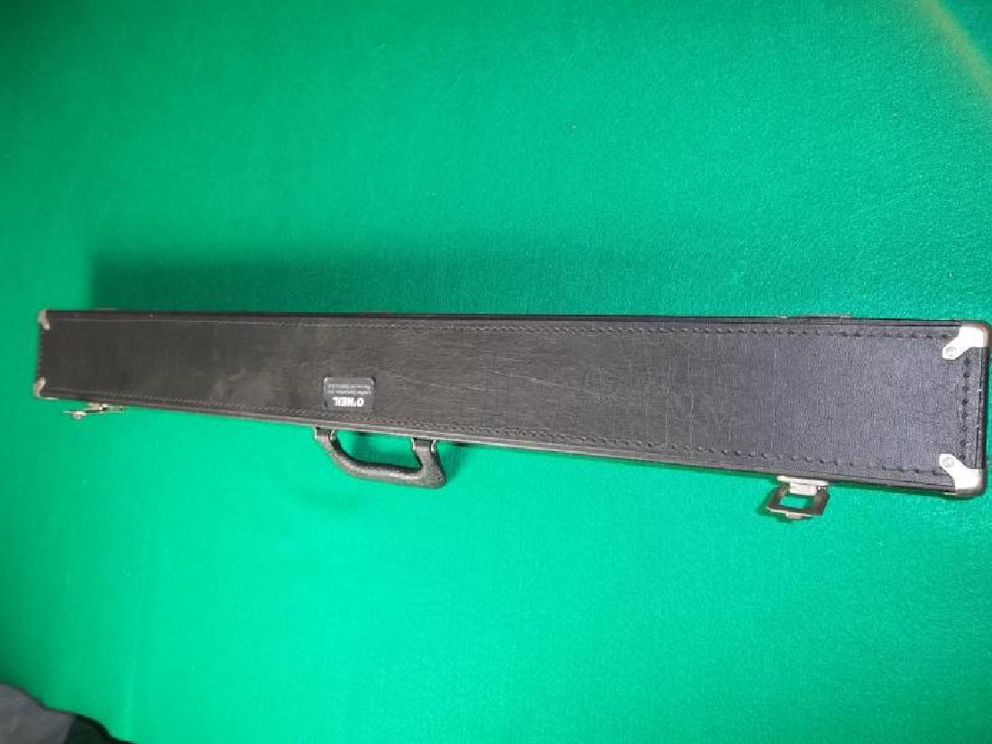 Meucci Pool Cue, 2 piece, 58", pearl inlay,: Meucci Pool Cue, 2 piece, 58", pearl inlay, scratches on butt sleeve, rust on collar, hard black case, worn, 34" l,scratches on butt sleeve, rust on collar, hard black case, worn, 34" l