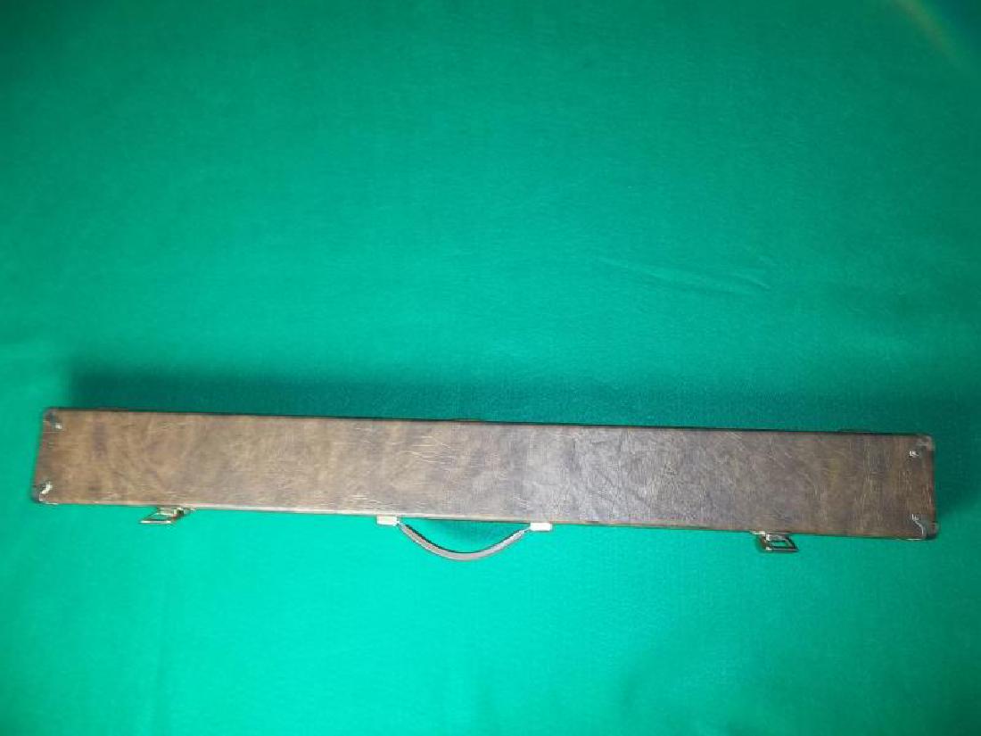 Huebler Pool Cue, 2 piece, 58", veneer is: Huebler Pool Cue, 2 piece, 58", veneer is cracking on butt sleeve and shaft, hard brown Huebler case with handle, brass corners rusted, 32.5" l,cracking on butt sleeve and shaft, hard brown Huebler ca