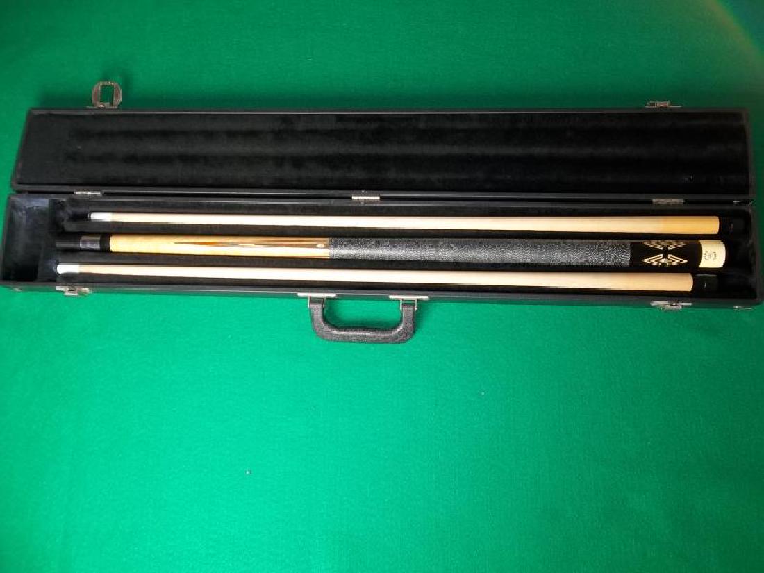 Joss Pool Cues, 1 butt and 2 shafts, 58", pearl: Joss Pool Cues, 1 butt and 2 shafts, 58", pearl inlay, plastic screw on Joss caps on each piece, hard black case with handle, end compartment for chalk, 34.25" l,inlay, plastic screw on Joss caps on e