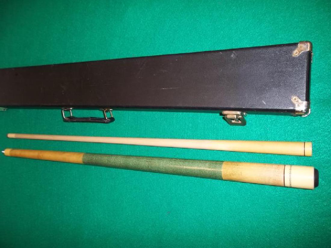 Meucci Oringinals Pool Cue, 2 piece, butt sleeve: Meucci Oringinals Pool Cue, 2 piece, butt sleeve and forearm are dirty, ring near collar joint has 2 chips, in hard black case with handle, case does not close, one buckle missing, other buckle does n