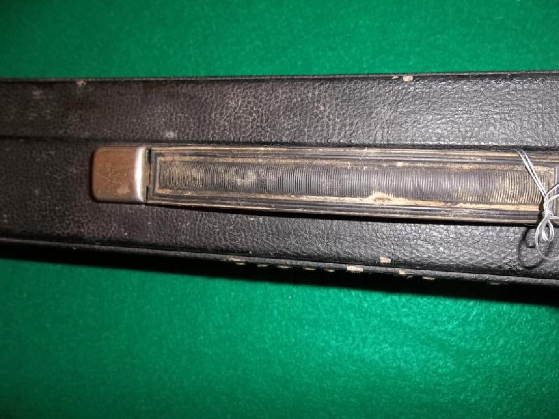 Huebler Pool Cue, 2 piece, 58", bumper, butt: Huebler Pool Cue, 2 piece, 58", bumper, butt sleeve and ferrule discolored, hard black Huebler case, metal is rusted, right buckle doesn't close correctly, case and strap worn, 31.25" l,sleeve and fer