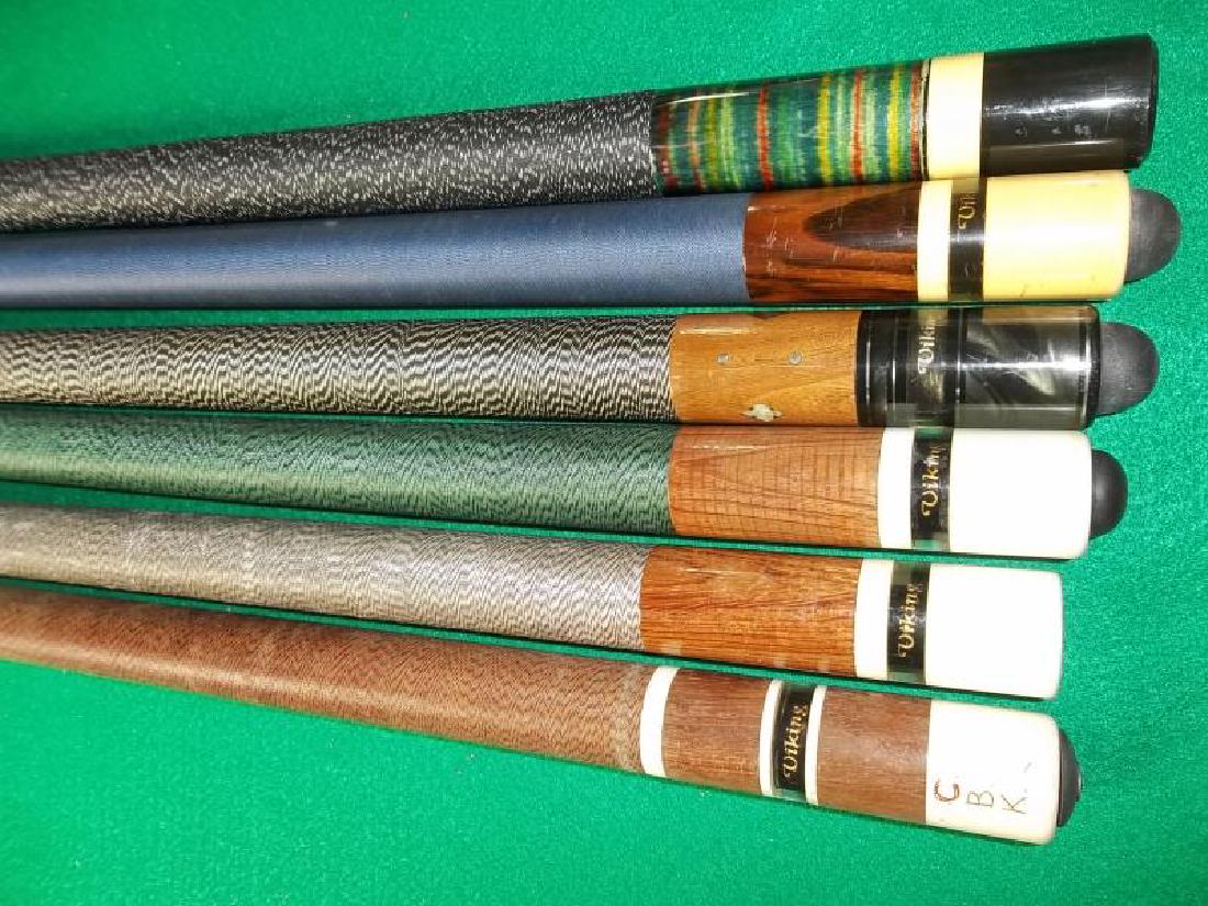 6 Pool Cues, not straight, most are 57", 5: 6 Pool Cues, not straight, most are 57", 5 Vikings with clear window, 1 unknown cue, 2 pieces each, 1 Viking has pearl and wood inlay, 1 Viking has CBK initials carved in butt end and worn wrap, 1 Vik