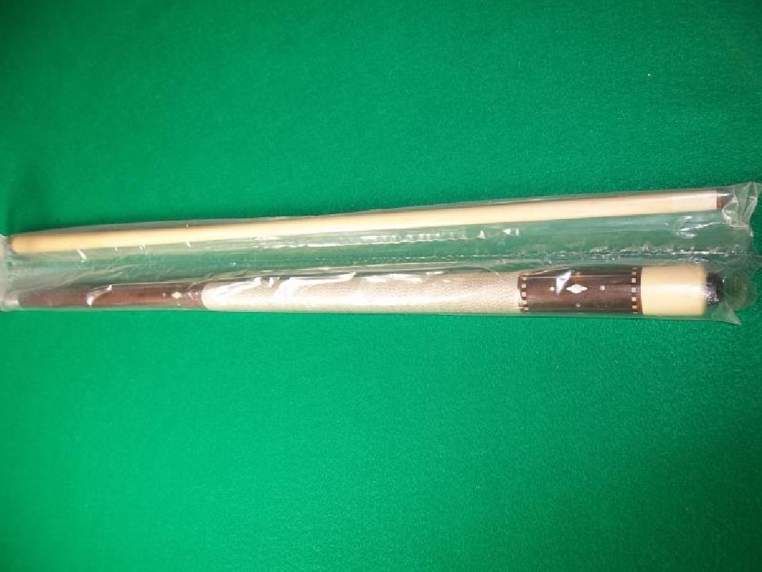 Palmer Custom Cue, not straight, PM 10, 2 piece,: Palmer Custom Cue, not straight, PM 10, 2 piece, 58", 19 oz, pearl inlay, scratches and dents on forearm, in plastic sleeve,58", 19 oz, pearl inlay, scratches and dents on forearm, in plastic sleeve