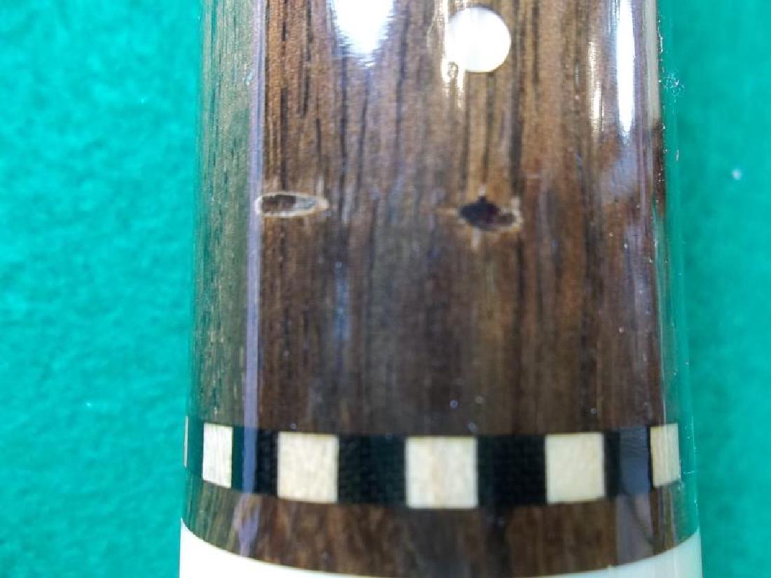 Palmer Custom Cue, PM 10, 2 piece, 58", 20 oz,: Palmer Custom Cue, PM 10, 2 piece, 58", 20 oz, pearl inlay,veneer damage to butt sleeve, in plastic sleeve,pearl inlay,veneer damage to butt sleeve, in plastic sleeve