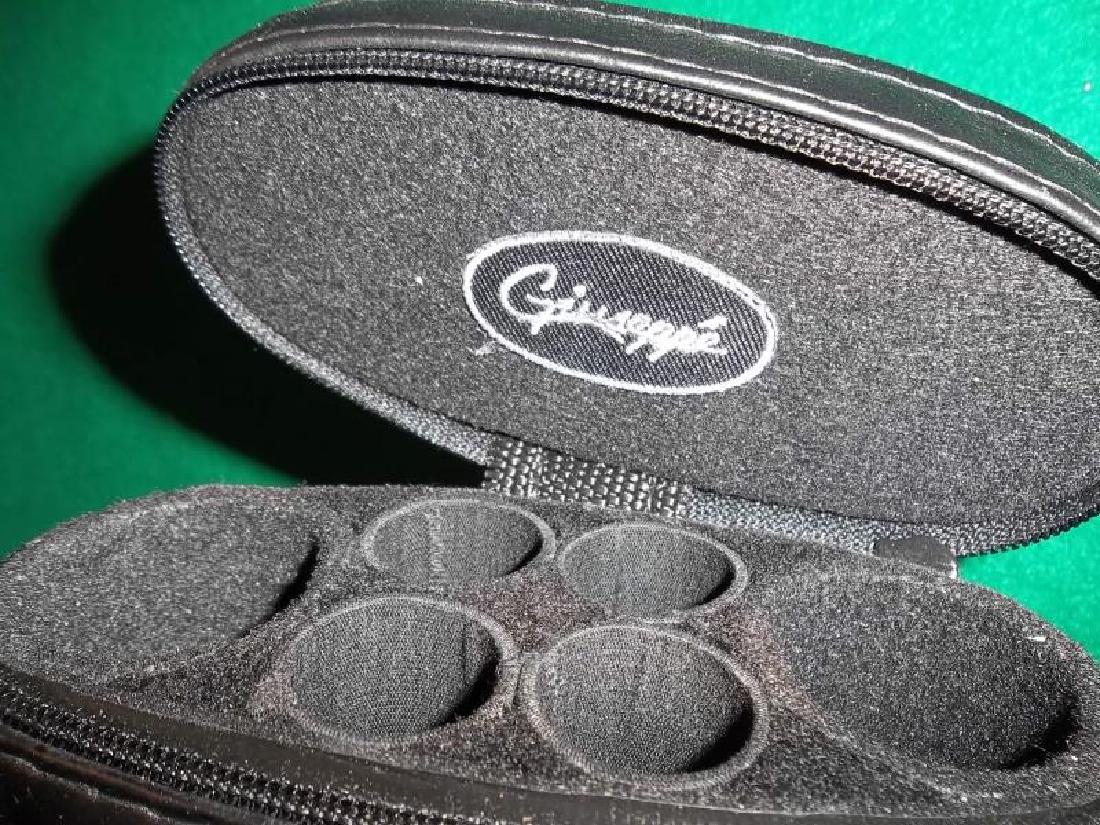 1 Case, hard black, Giuseppe, 2 zippered pockets,: 1 Case, hard black, Giuseppe, 2 zippered pockets, strap and handle, holds 2 butts and 4 shafts, 34.5" l,strap and handle, holds 2 butts and 4 shafts, 34.5" l