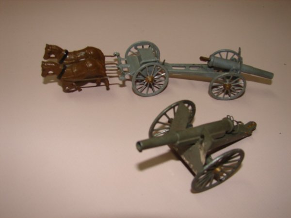 2 Toy Lead Cannons, one France, one wih team of h