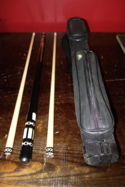 Meucci Pool Cue, 3 piece, one butt and 2 shafts, 57.5": Meucci Pool Cue, 3 piece, one butt and 2 shafts, 57.5" l, scratches on forearm, 1 shaft has pen marks, in hard black fabric 4 hole Imperial case, 2 pockets, strap, case is dirty, 32" l