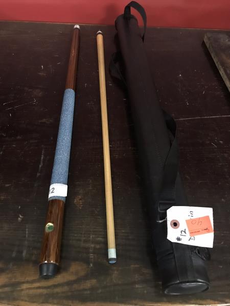 Dufferin Pool Cue, 2 piece, 57", 20 oz, made in Canada,: Dufferin Pool Cue, 2 piece, 57", 20 oz, made in Canada, with green leaf, butt is peeling near bumper, hard black case with strap, 32" l