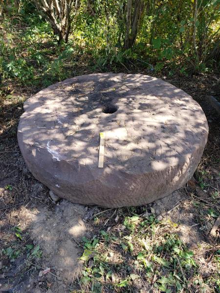 Large Mill Stone, red rock, 65" diameter (1 of 3)