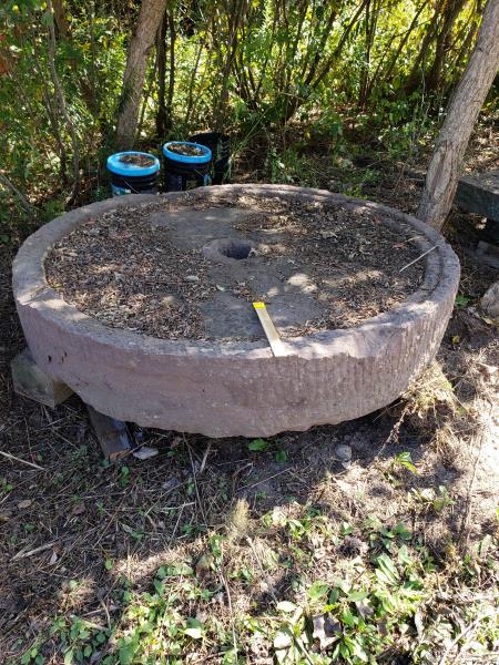 Large Mill Stone, red rock, 65" diameter (1 of 2)