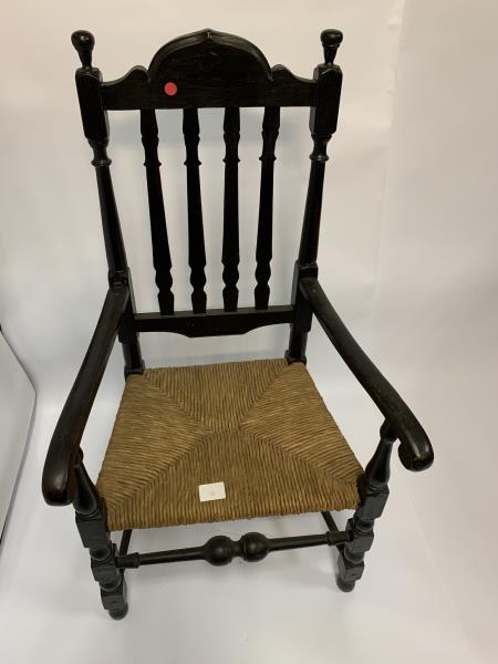 Arm Chair, bannister back, black paint, rush seat, 4: black paint, rush seat, 4 slat back, bulbous front rung, worm holes on lower frame, damage to right side post, 15 1/2" to top of seat and 44" to top crest