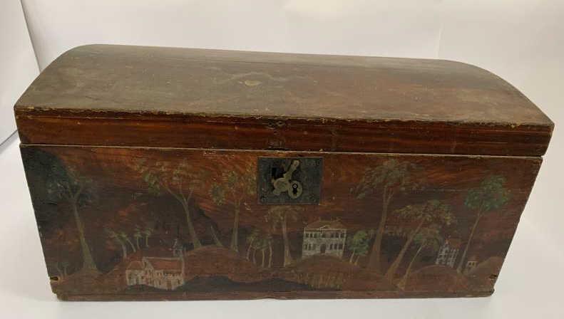Dome Chest, painted & decorated red grain paint,: red grain paint, houses, churches and trees, average wear, some paint loss, cracks, nicks and scrapes, 11" t x 12 1/2" d x 24" l