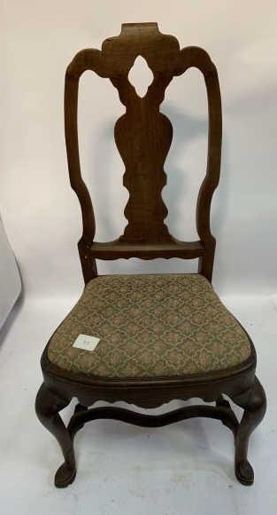 Queen Anne Slipper Chair walnut, shoe style foot, slip: walnut, shoe style foot, slip seat, front feet split, worm holes throughout, 37" to crest, 15" to top of seat