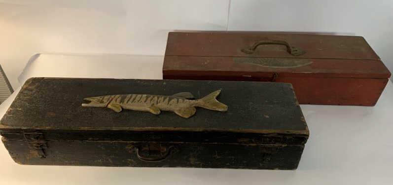 2 Country Fishing Boxes red one with iron handle, black: red one with iron handle, black one with fish on top, poor condition, red one is 29" long and black one is 31" long