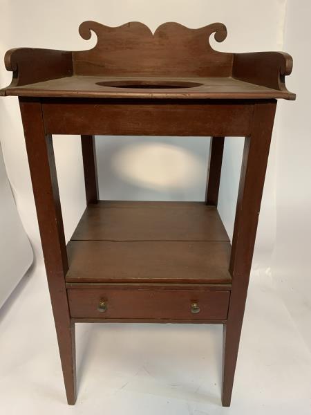 Country Wash Stand, One Drawer Country wash stand, one: Country wash stand, one drawer, brass pulls, split top, lower shelf and crest, red wash, 36” t x 19” w x 18” d