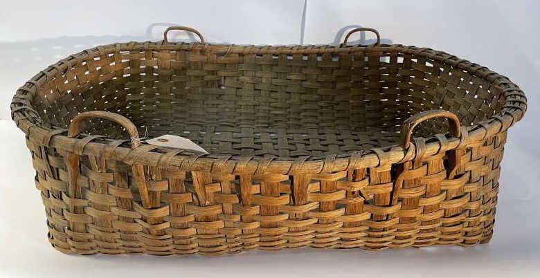 Splint Basket handled, bottom damage, missing a few: handled, bottom damage, missing a few pieces, 9 1/2" t x 27" x 37"