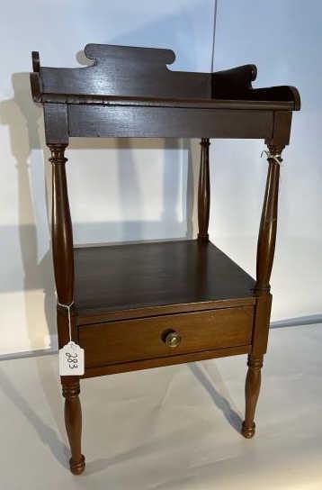 Wash Stand, commode, pine, 1 drawer, cut out back, dark: pine, 1 drawer, cut out back, dark brown stain, lower shelf cracked, top crackfloor to surface to wash basin shelf: 30"width: 18"depth: 18"Back: (from floor to top of decorative back) 35"Bottom to low