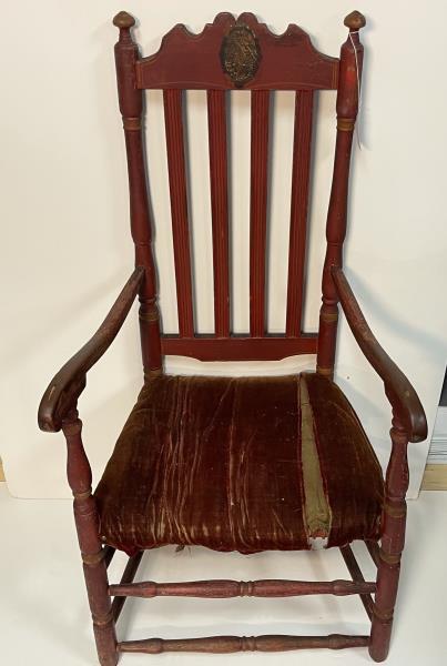 Bannister Back Arm Chair Painted red, 4 redded slat: Painted red, 4 redded slat back, painted black oval medallion on crest, very fine gold line decoration, front leg old repair, worn finish & paint, many rough areas, seat old material torn, 44 1/2" top